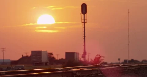 Highway with large sun at 120 fps slow motion near Austin, Texas. Stock Footage 73338227