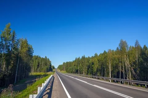 Highway with markings on the sky background. Stock Photos