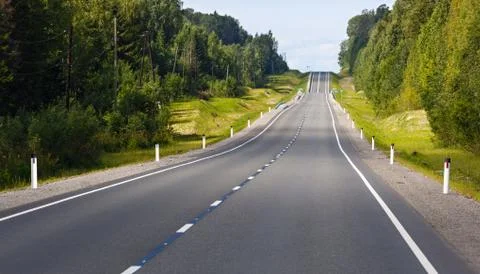 Highway with markings on the sky background. Stock Photos
