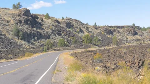 A highway with a mountain in the background Video stock 155591560