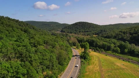 Highway into the Mountains in 4K Stock Footage 244475595