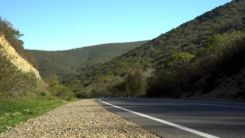 Highway in the mountains Video stock 143475415