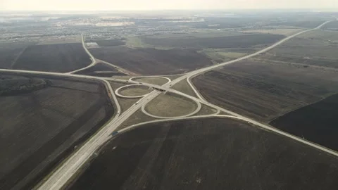 Highway outside the city with a large interchange. aerial shooting Video stock 152989597
