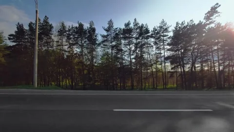 Highway outside the city. View through right side window on passenger seat of Видео 255635703