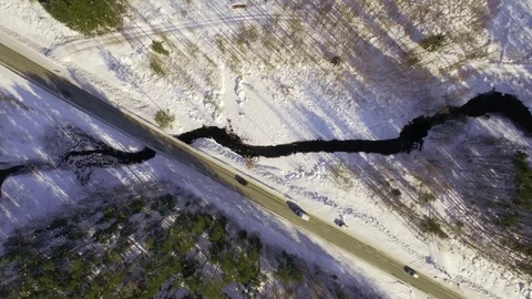 Highway over small river in winter landscape. Stock Footage 88203392