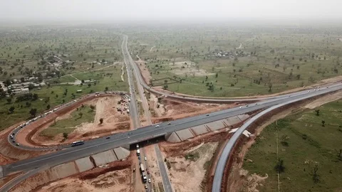 Highway overpass twisting bendy road in Senegal, West Africa Stock Footage 106867422