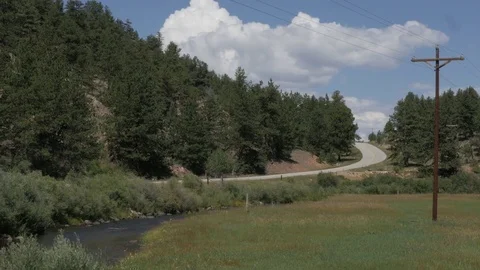 Highway with River in Foreground in Lake George CO Stock Footage 85214420