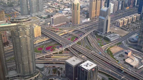 Highway road interchange or junction with urban car traffic in early morning in Stock Footage 125628371