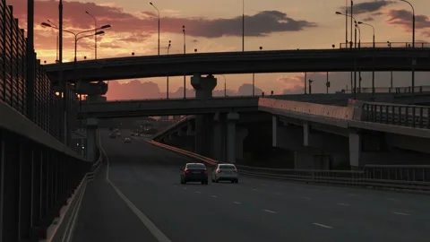 Highway road junction in dramatic sunset 動画素材 136923001