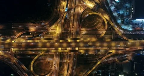 Highway road junctions at night Intersecting freeway road overpass ring road Stock Footage 134969565