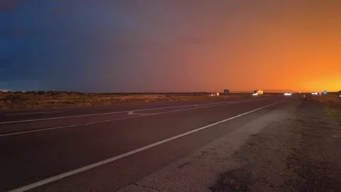 Highway road with traffic on it. sunset and rain, thunder and lightning Stock Footage 248122532