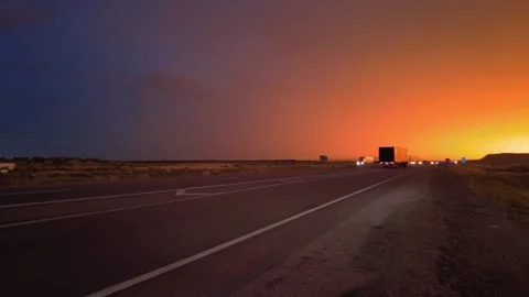 Highway road with traffic on it. sunset and rain, thunder and lightning Stock Footage 248122555