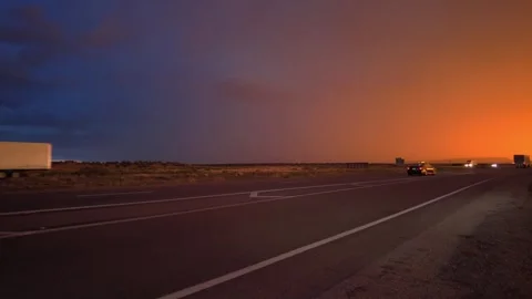 Highway road with traffic on it. sunset and rain, thunder and lightning Stock Footage 248122559