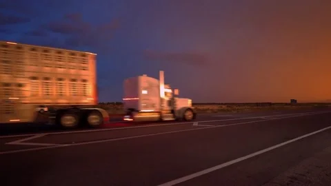 Highway road with traffic on it. sunset and rain, thunder and lightning Stock Footage 248122560