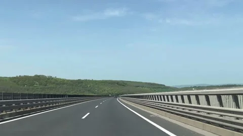 Highway road trip view from the front window on an empty road, high speed. Stock Footage 314298746