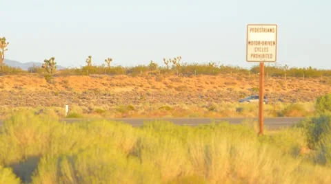 Highway sign in the desert Stock Footage 9544229