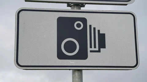 Highway Speed Camera Sign on Cloudy Day Represents Road Safety 스톡 동영상 319000210