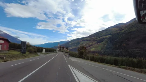 On Highway SS38, driving pass Chiesa di Maria Lourdes. Stock Footage 270751122