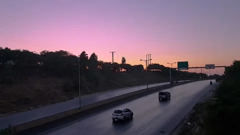 The highway with sunset Stock Footage