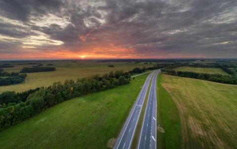Highway at sunset Stock Photos