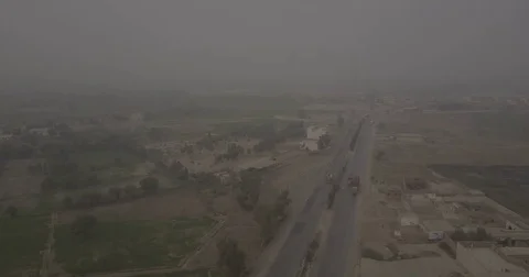 A highway surrounding with fields 動画素材 75736313