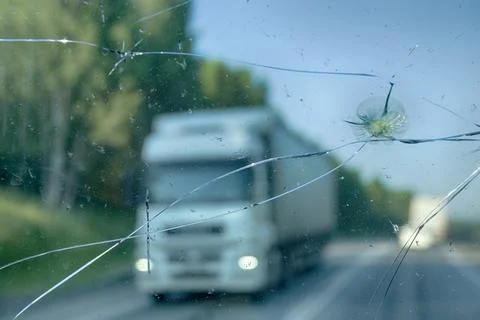 Highway through a broken windshield Stock Photos