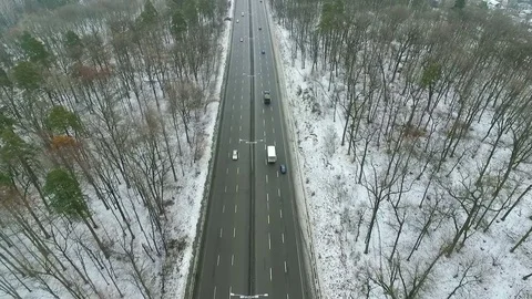 Highway through forest in winter. Aerial view. Stock Footage 71020855