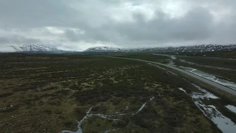 Highway through open field of Boreal Tundra, Aerial View Stock Footage 289565972