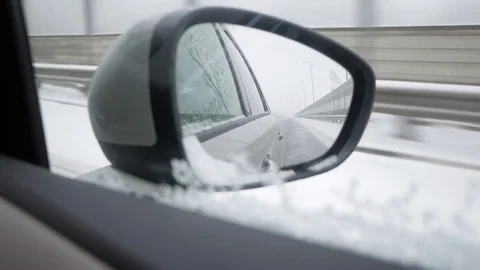 Highway through rearview mirror Stock Footage 72715633