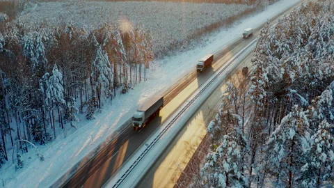 Highway through snow forest at winter frozen day. Stock Footage 146846490
