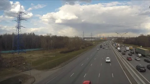 Highway Traffic and clouds in a Spring Day Timelapse Stock Footage 82049283