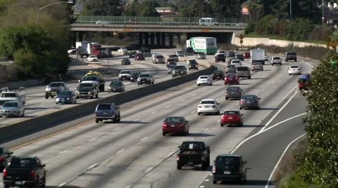 Highway Traffic around Bend Stock Footage 1100941