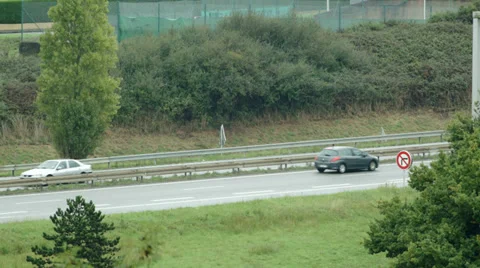 Highway Traffic behind the trees. Vannes, France. Stock Footage 32188002
