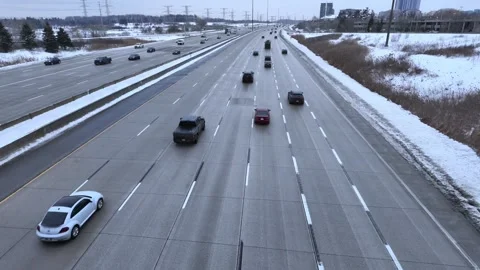 Highway traffic driving through Toronto in winter Stock Footage 332575286