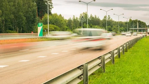 Highway traffic during summer with a speed camera Stock Footage 100702677