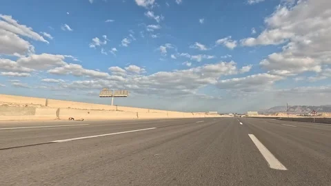 Highway Traffic Flow Through Desert Route Between Cairo and Ain Sokhna Stock Footage 330031616