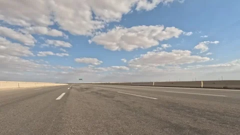 Highway Traffic Flow Through Desert Route Between Cairo and Ain Sokhna Stock Footage 330036698