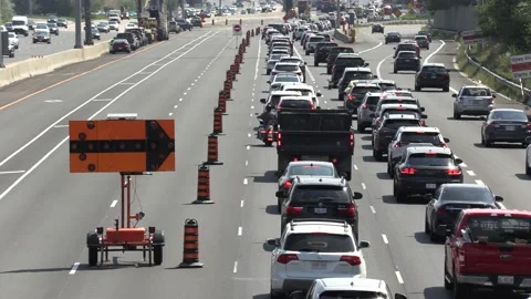 Highway traffic jam and construction gridlock in summer heat Stock Footage 137453271