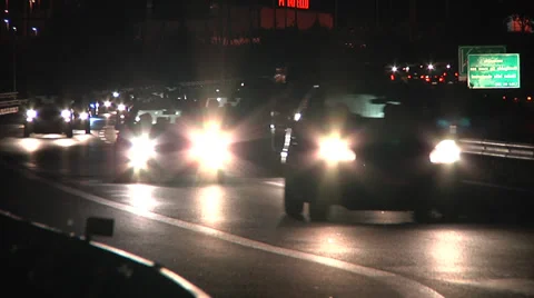 Highway traffic at night Stock Footage 32346769