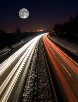 Highway traffic at night Stock Photos