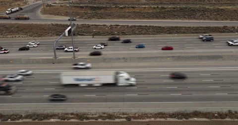 Highway traffic - sliding aerial hyper lapse or motion time lapse Stock Footage 337738652
