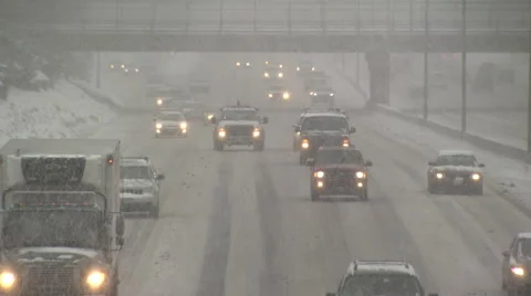 Highway traffic in a snowstorm Stock Footage 46719541