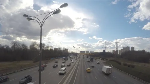 Highway traffic on spring day timelapse 動画素材 78015514