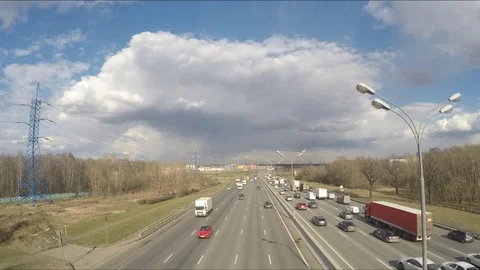 Highway traffic on spring timelapse Stock Footage 78015837
