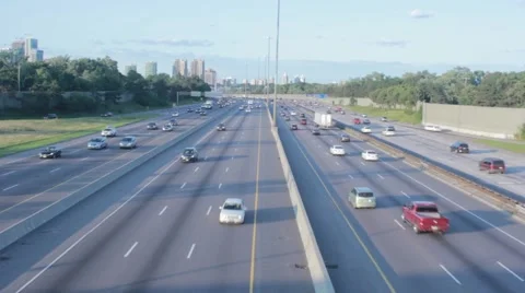 Highway traffic in Sunset Stockbeeldmateriaal 42128385