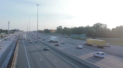 Highway Traffic in Sunset Stockbeeldmateriaal 42128689