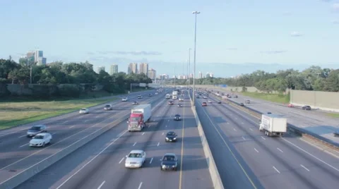 Highway Traffic in Sunset (tilt down) Stockbeeldmateriaal 42128464