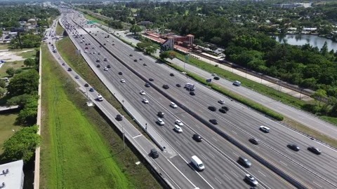 Highway Traffic Surrounded by Greenery, Florida Aerial View Stock Footage 340519142