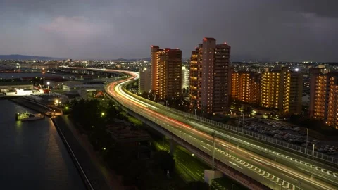 Highway Traffic Timelapse from Day to Night in Osaka Japan Urban Cityscape Video stock 331728706