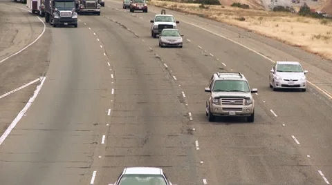 Highway Traffic with Tractor Trailers with Wide loads Stock Footage 8516945